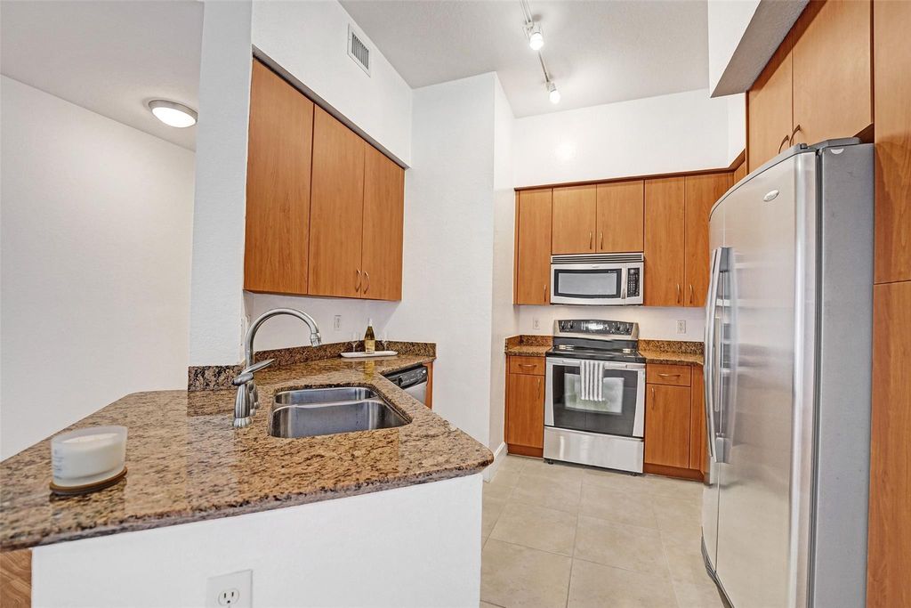 Photo of 1830 Radius Dr #1317, Hollywood, FL 33020 (MLS # F10532466)