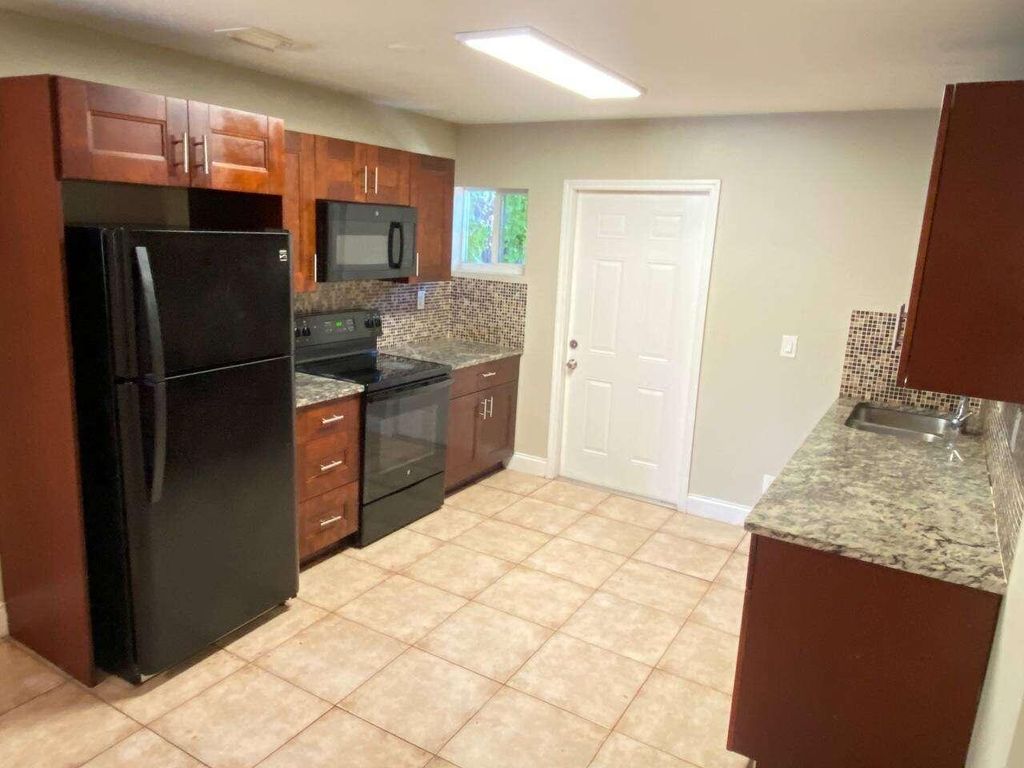 Photo of 141 NW 10th Street #B, Pompano Beach, FL 33060 (MLS # B26006089)