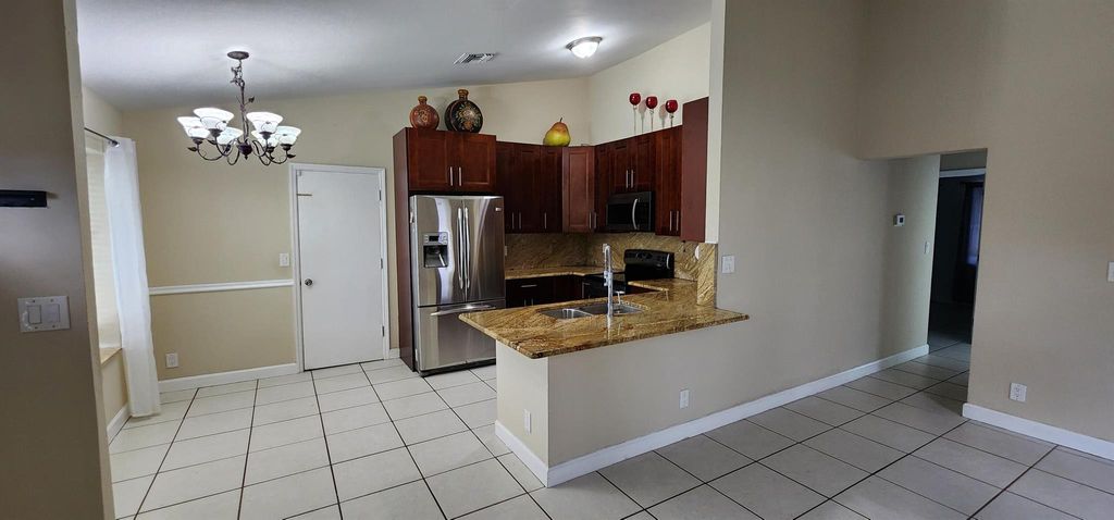 Photo of 22943 Sandalfoot Boulevard, Boca Raton, FL 33428 (MLS # R11026058)