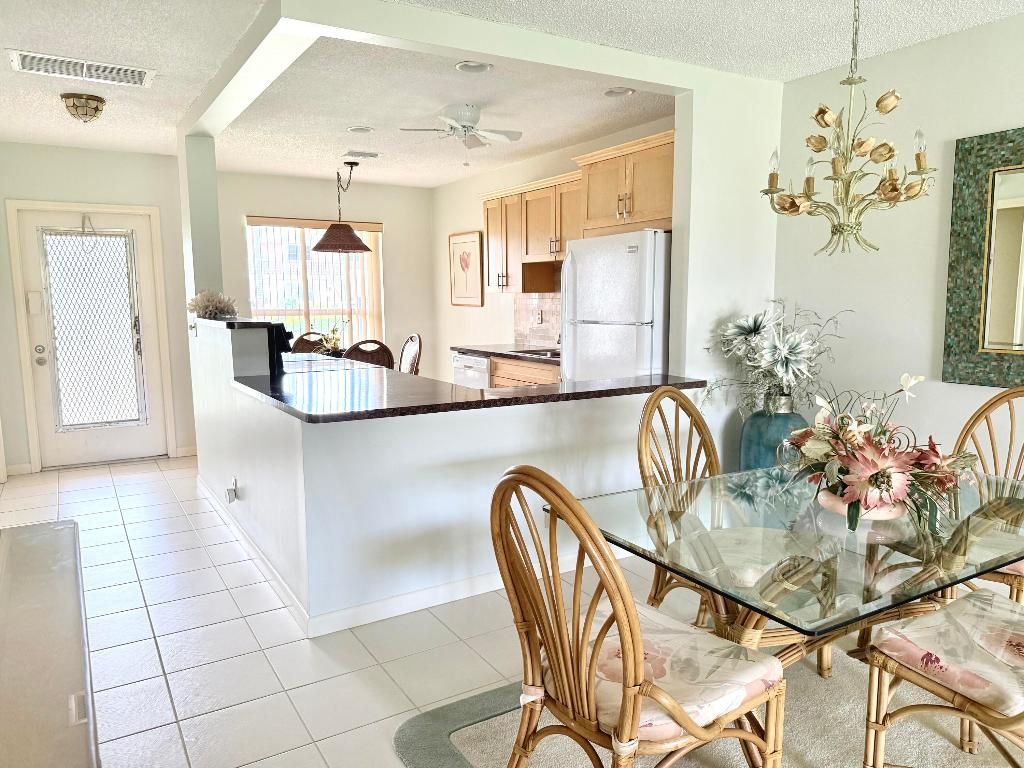 Photo of 1661 NW 20th Avenue #61/B, Delray Beach, FL 33445 (MLS # R11101478)