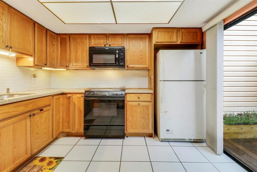 Looking for a home in the heart of Jupiter? This two-story townhouse located at 128 Sherwood Circle 13B, Jupiter, is a fantastic investment opportunity with no rental restrictions! Enjoy this 2 bedroom, 2.5 bathroom, 2 story townhouse with an updated primary bathroom. Kitchen features wood cabinetry and newer appliances. Enjoy morning coffee on the screened back patio. Parking is just outside the door. Close to restaurants, shops, medical, community parks. Conveniently close to top rated schools like Jerry Thomas Elementary, Independence Middle School and Jupiter High. Don't miss out! Important Stuff: A/C 2013 (serviced annually), HWT 2018.