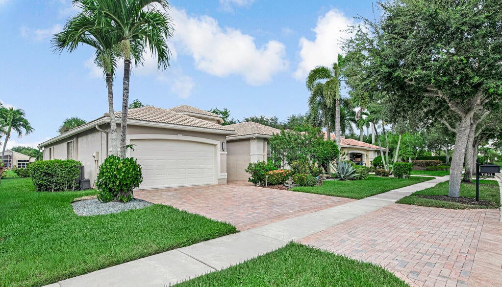 Photo of 7911 Ferndale Bend Drive, Lake Worth, FL 33467 (MLS # B26070640)