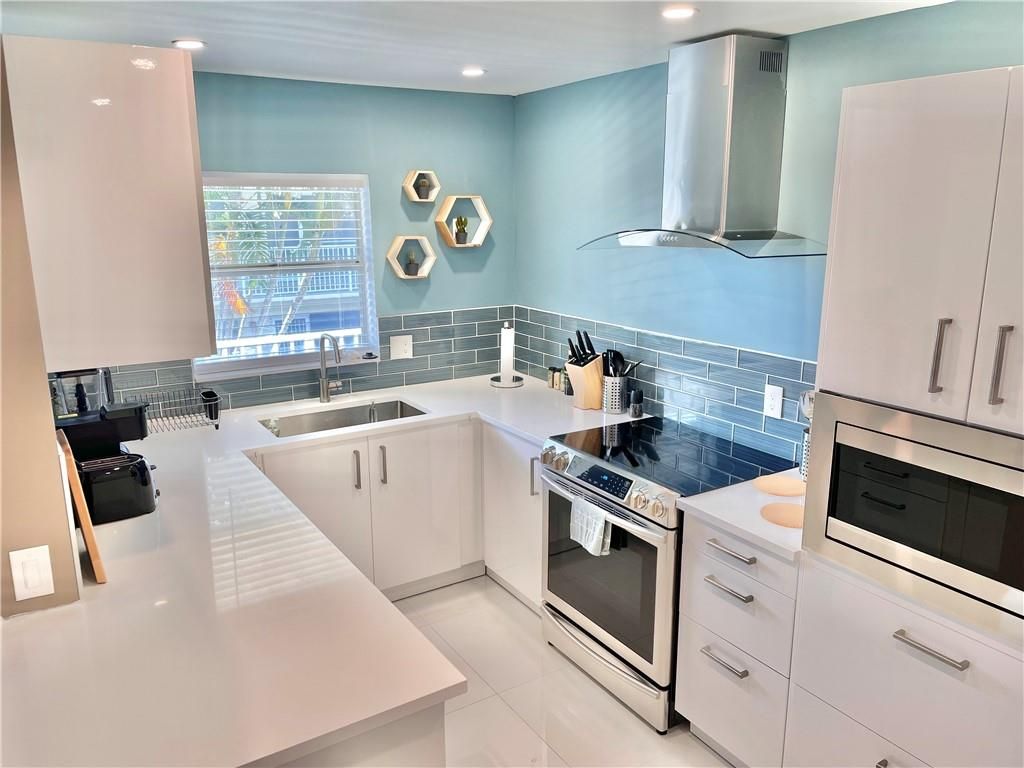 Photo of 640 Snug Harbor Dr #F12, Boynton Beach, FL 33435 (MLS # F10356014)