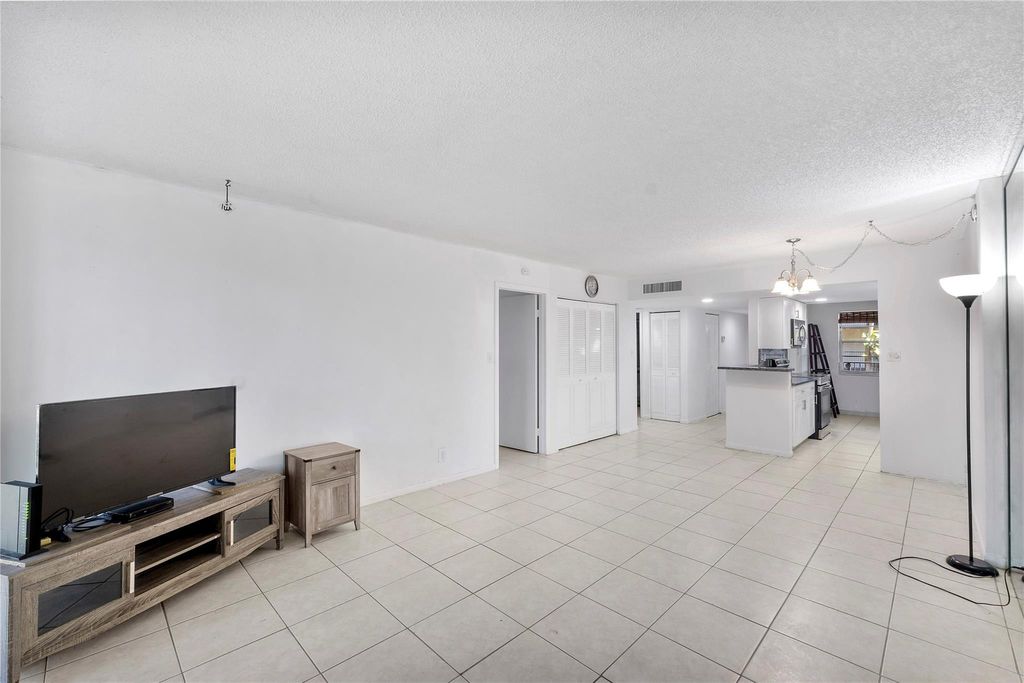 Photo of 3341 NW 47th Terrace #206, Lauderdale Lakes, FL 33319 (MLS # F10550549)