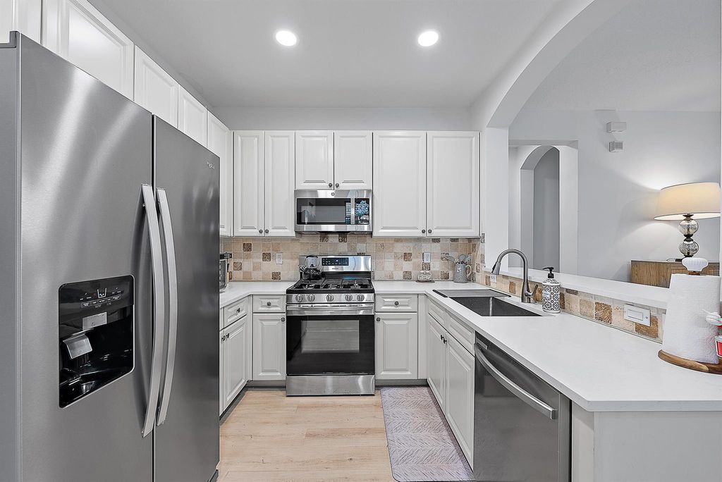 Photo of 111 Evergrene Parkway, Palm Beach Gardens, FL 33410 (MLS # R11069032)