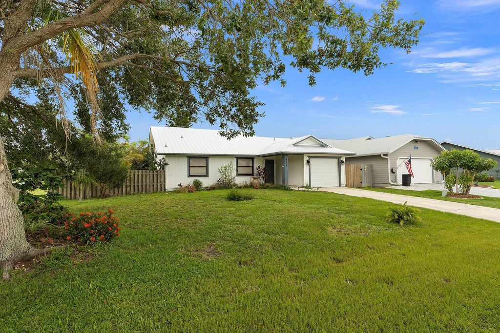 Photo of 4232 SE Jacaranda Street, Stuart, FL 34997 (MLS # R10904678)