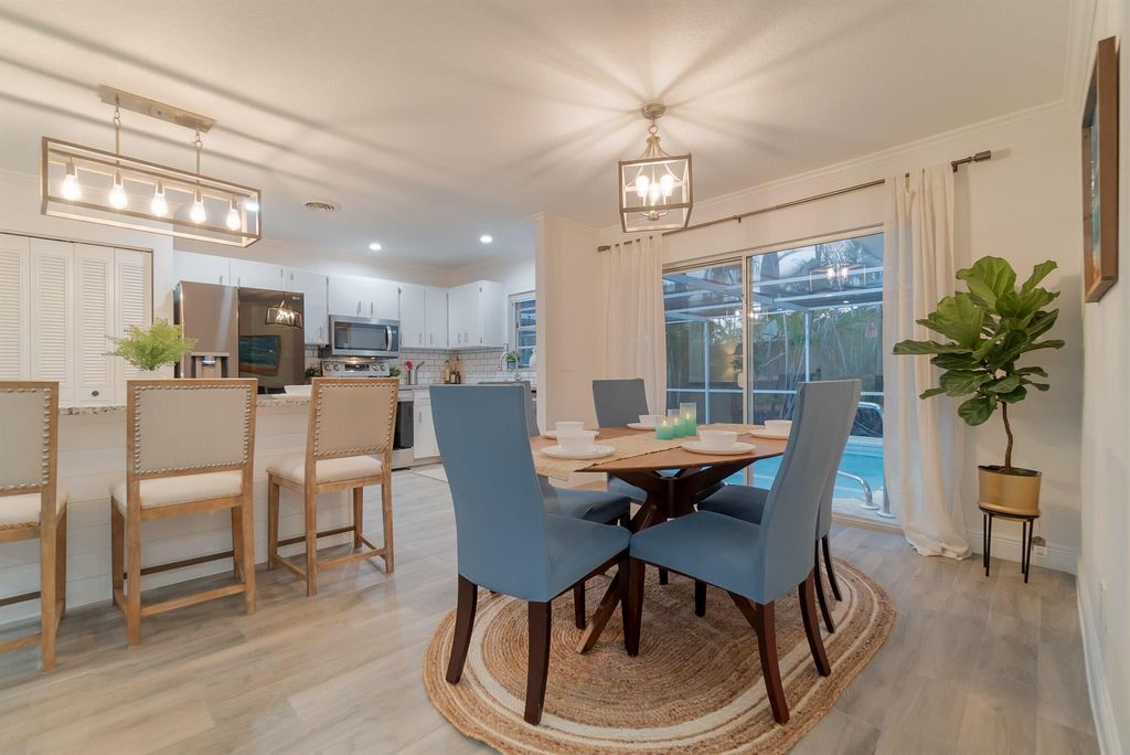 Photo of 1641 NE 24th Terrace, Jensen Beach, FL 34957 (MLS # R11079129)