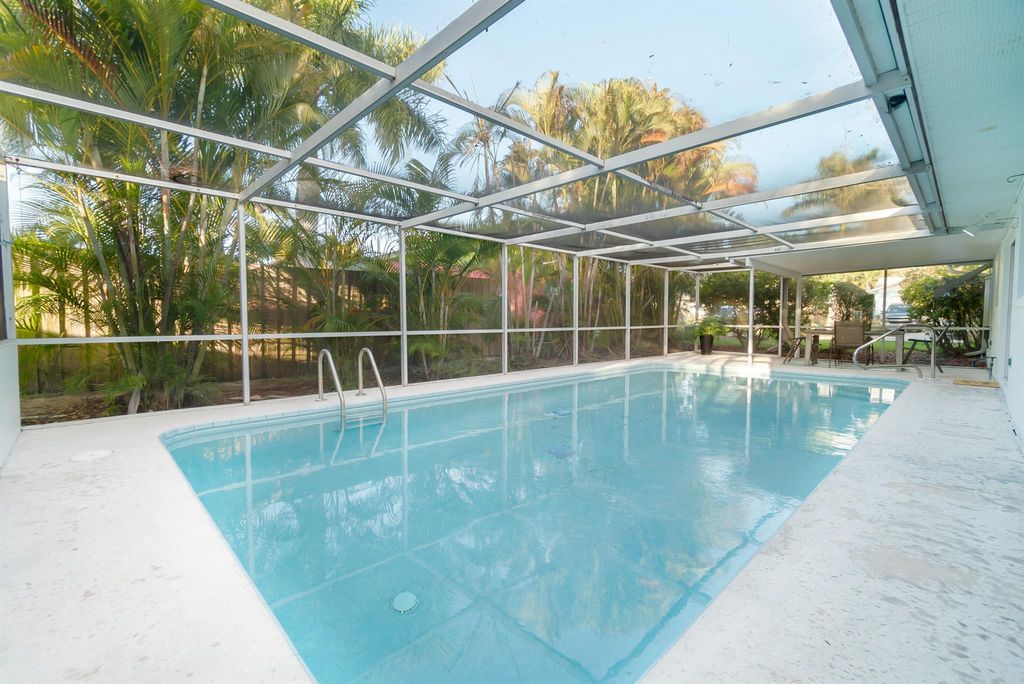 Photo of 1641 NE 24th Terrace, Jensen Beach, FL 34957 (MLS # R11079129)