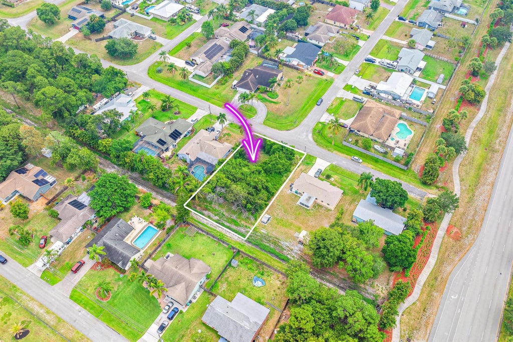 Photo of 1432 SW Irving Street, Port Saint Lucie, FL 34983 (MLS # R10988330)