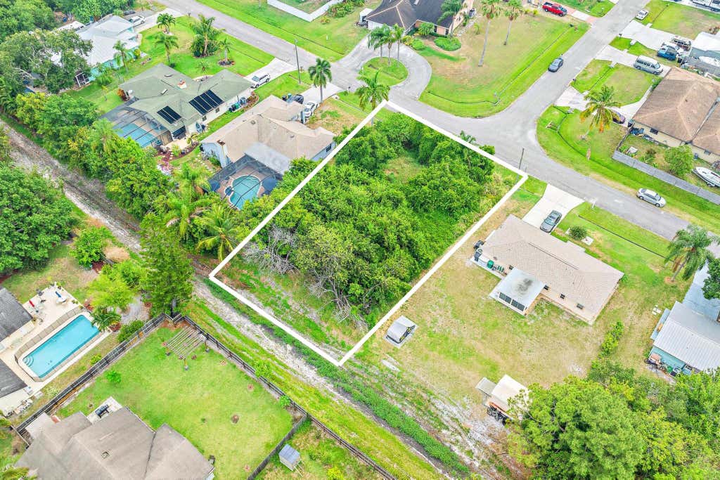 Photo of 1432 SW Irving Street, Port Saint Lucie, FL 34983 (MLS # R10988330)