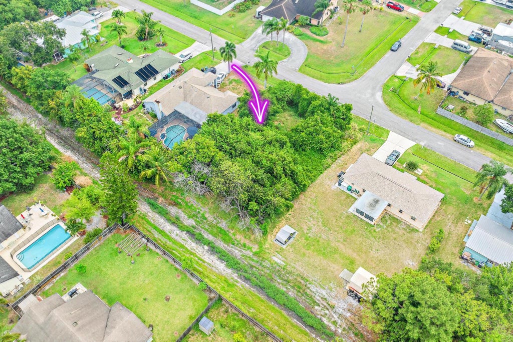 Photo of 1432 SW Irving Street, Port Saint Lucie, FL 34983 (MLS # R10988330)