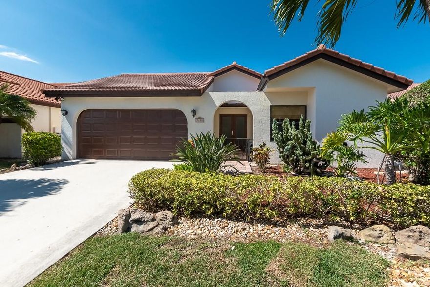 A LOVELY WATERFRONT PROPERTY FEATURING 3 BEDROOMS  &  2 BEAUTIFULLY  REMODELED BATHS PLUS A VERY PRIVATE SCREENED-IN PATIO AND HEATED POOL WITH WATERFALLS.THIS HOME HAS ALL IMPACT GLASS SLIDING DOORS AND FRONT DOORS, AND HURRICANE IMPACT GARAGE DOORS. A NEW AIR CONDITIONER WAS INSTALLED THIS YEAR, 2022! There is a large eat-in kitchen with lots of cabinet & pantry, master bedroom with walk-in closet, master bathroom has w/dual sinks and cabinets, separate shower, freestanding tub,& an updated guest bathroom. There is a koi pond in the atrium, 2 car garage has attic space & updated electric box . RING doorbell plus key pad entry. LOW HOA fees, community tennis courts, close to Del Prado Elementary, Boca Raton Town Center Mall, parks, schools, highways, and The Temple and places of worship. A LOVELY WATERFRONT PROPERTY FEATURING 3 BEDROOMS  &  2 BEAUTIFULLY  REMODELED BATHS PLUS A VERY PRIVATE SCREENED-IN PATIO AND HEATED POOL WITH WATERFALLS.THIS HOME HAS ALL IMPACT GLASS SLIDING DOORS AND FRONT DOORS, AND HURRICANE IMPACT GARAGE DOORS. A NEW AIR CONDITIONER WAS INSTALLED THIS YEAR, 2022! There is a large open kitchen with lots of cabinet & pantry, a large master bedroom with walk-in closet, master bathroom  w/dual sinks and cabinets, separate shower, freestanding tub, updated guest bathroom. There is a koi pond in the atrium, 2 car garage has attic space & updated electric box and RING doorbell plus key pad entry. LOW  HOA fees, community tennis court, close to Del Prado Elementary, Boca Raton Town Center Mall, parks, schools, highways, and The Temple and places of worship.