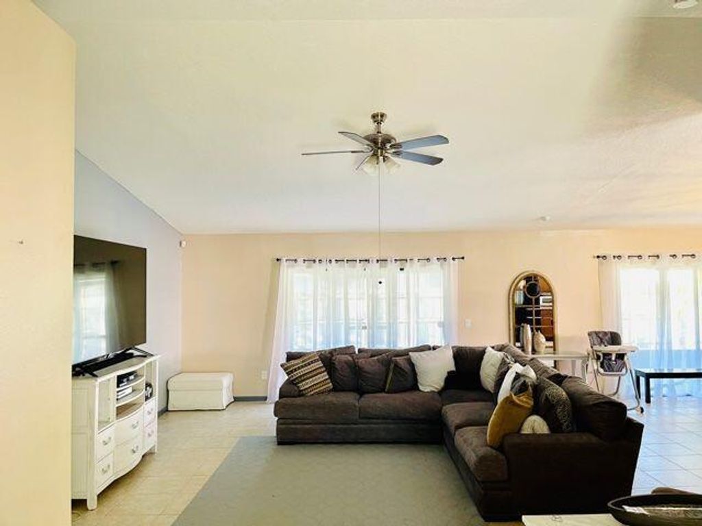 Photo of 174 Roycourt Circle, Royal Palm Beach, FL 33411 (MLS # R11099285)