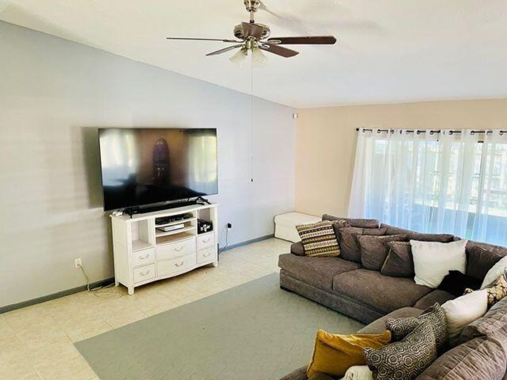 Photo of 174 Roycourt Circle, Royal Palm Beach, FL 33411 (MLS # R11099285)
