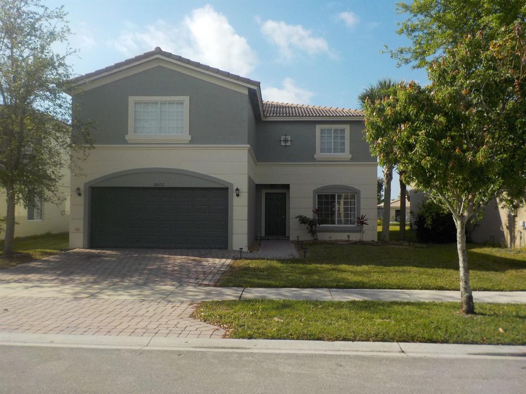 Photo of 2072 SW Marblehead Way, Port Saint Lucie, FL 34953 (MLS # R10979028)