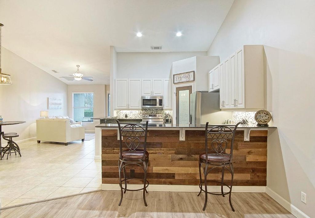 Photo of 10575 SW Cam Run, Port Saint Lucie, FL 34987 (MLS # R11155363)