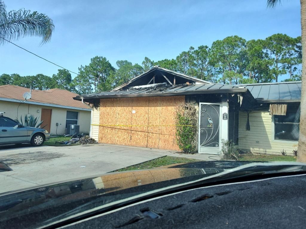 Photo of 721 NW Selvitz Road, Port Saint Lucie, FL 34983 (MLS # R11102620)