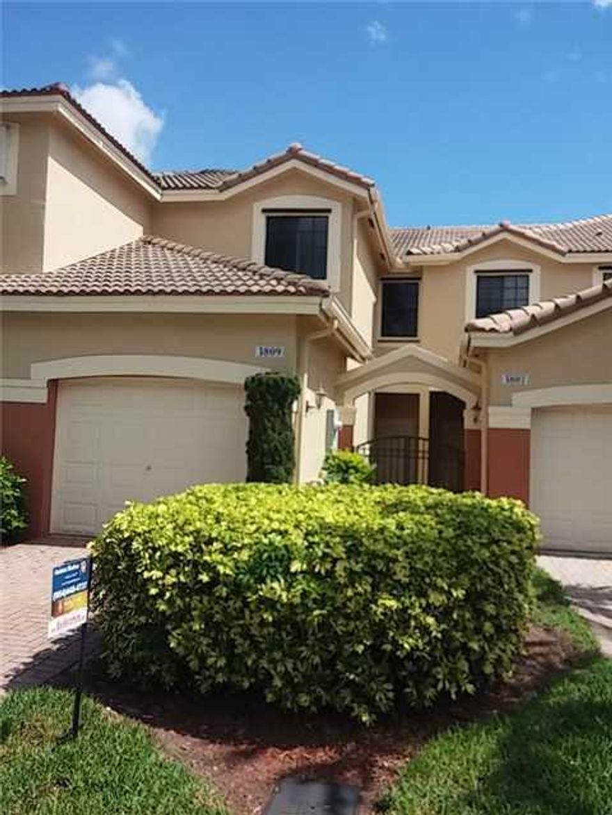 New A/C (2015) Dorado Model is located in the highly desired community, Courtyard at the Grove, directly across from park.  Screen Patio with private berm behind unit with large behind fence.  Eat-in Kitchen. Washer & Dryer inside unit. Tile & newer carpe t(2013), 1 Car Garage & Driveway. Access to Community Pool & Playground through gate. Security Patrol. Children can ride their bikes to Manatee Bay Elem. & walk to Cypress Bay HS.   Library & Library Park are located outside front gated entrance.
