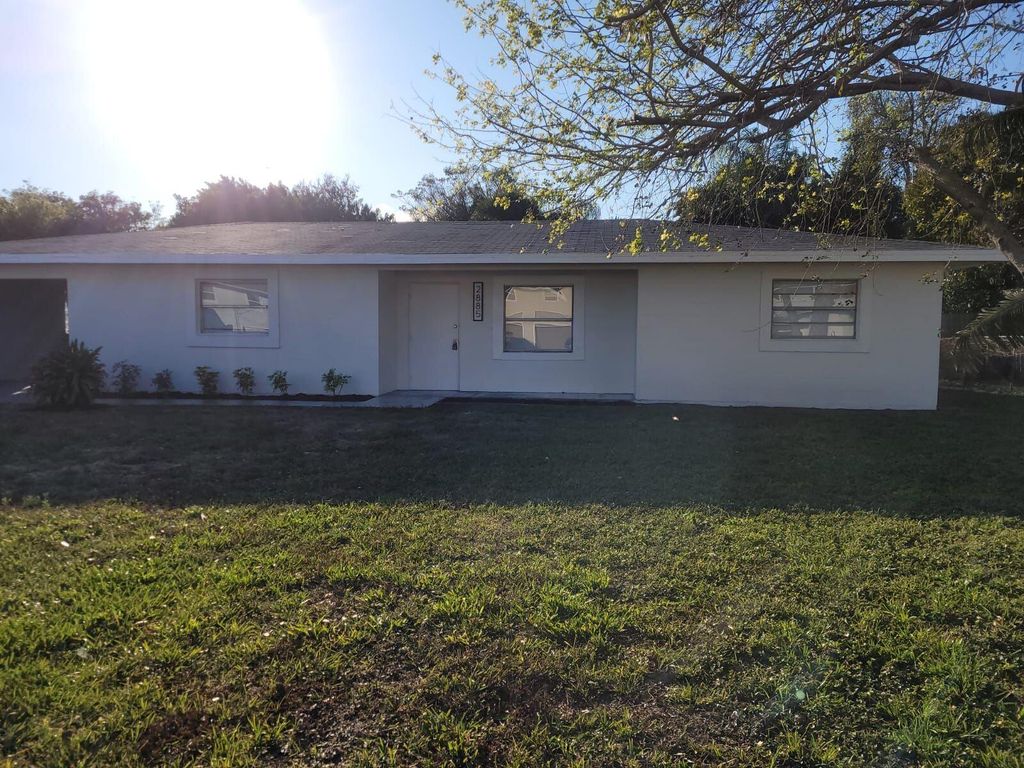 Photo of 2885 Harson Way, Fort Pierce, FL 34946 (MLS # R10776407)