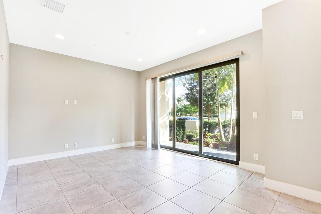 Photo of 5173 Beckman Terrace, Palm Beach Gardens, FL 33418 (MLS # R10923824)