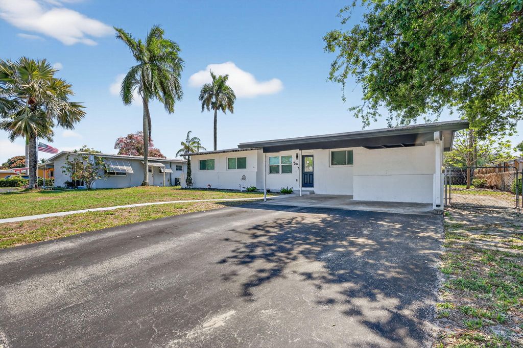 Photo of 353 Shady Lane Road, Palm Springs, FL 33461 (MLS # B26006691)