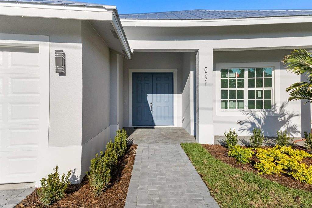 Photo of 3214 SW Hambrick Street, Port Saint Lucie, FL 34953 (MLS # R11079935)
