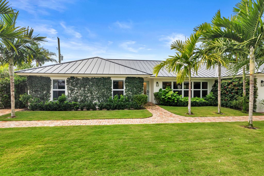 Photo of 7521 Edgewater Circle, Lake Clarke Shores, FL 33406 (MLS # R11169056)