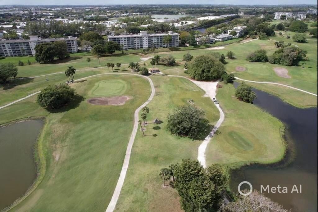 Photo of 2681 S Course Dr #511, Pompano Beach, FL 33069 (MLS # B26000935)