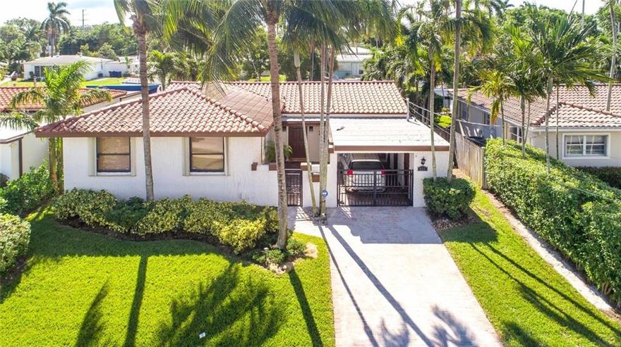 Minutes from downtown Fort Lauderdale this home boasts 2095 sq ft under air and is 3 bedroom 2 bathroom ocean access home with no fixed bridges.  Tropical backyard with large deck and boat lift.  Close proximity to Las Olas, Riverwalk, airport, fine dining and a short drive to the beach this home offers everything you could ask for in a waterfront property.  Nothing to do but move in and enjoy the updates.  Hurricane shutters and impact windows throughout.