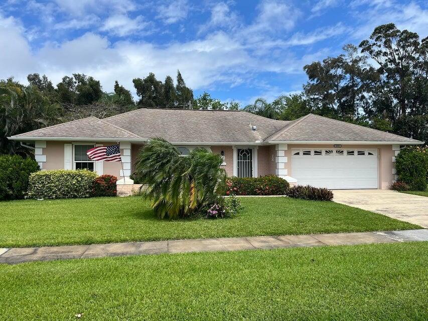 Welcome home to your 2 bedroom, 2 bathroom home with a 2 car garage. All appliances included in rental as well as lawn care and landscaping. Relax on your enclosed lanai taking in the views of the beautifully landscaped yard. Close to Sandpiper Bay resort and area beaches! New A/C and water heater.