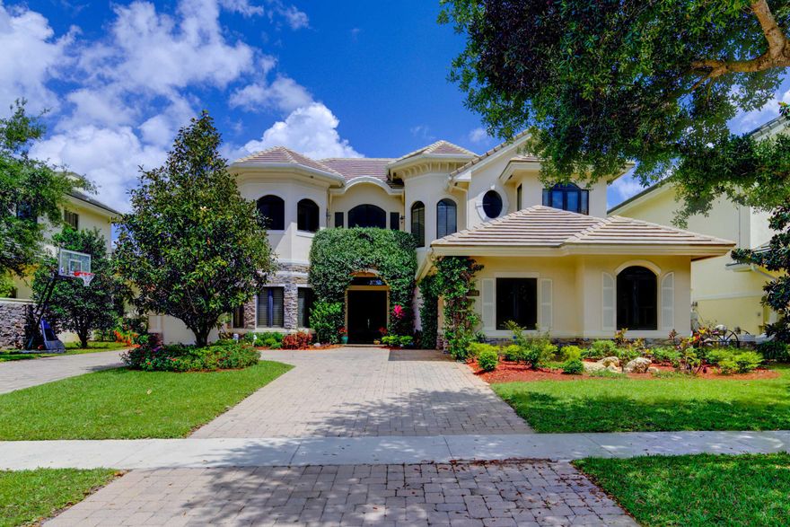 Rare find in Palm Beach next to Wellington, Delray and Boca!  Privacy, luxury and architectural finishes. Aprox. 6,572 total sqr ft estate family home overlooking 5 acres of HOA preserve. Two Story, 5 bedrooms, plus study and master suite with bonus room, 7 full baths, plus 1 half bath, family room, grand room, 3 car garage, pool/Jacuzzi, entire home installed impact glass! central vac system! wood and marble floors, custom light fixtures, designer curtains, faux finishes, summer patio kitchen, mango, lime, and banana trees, jasmines and magnolia tree. Near great schools Publix, Wawa, Starbucks, Frank's theatre, wellington mall, close to turnpike.