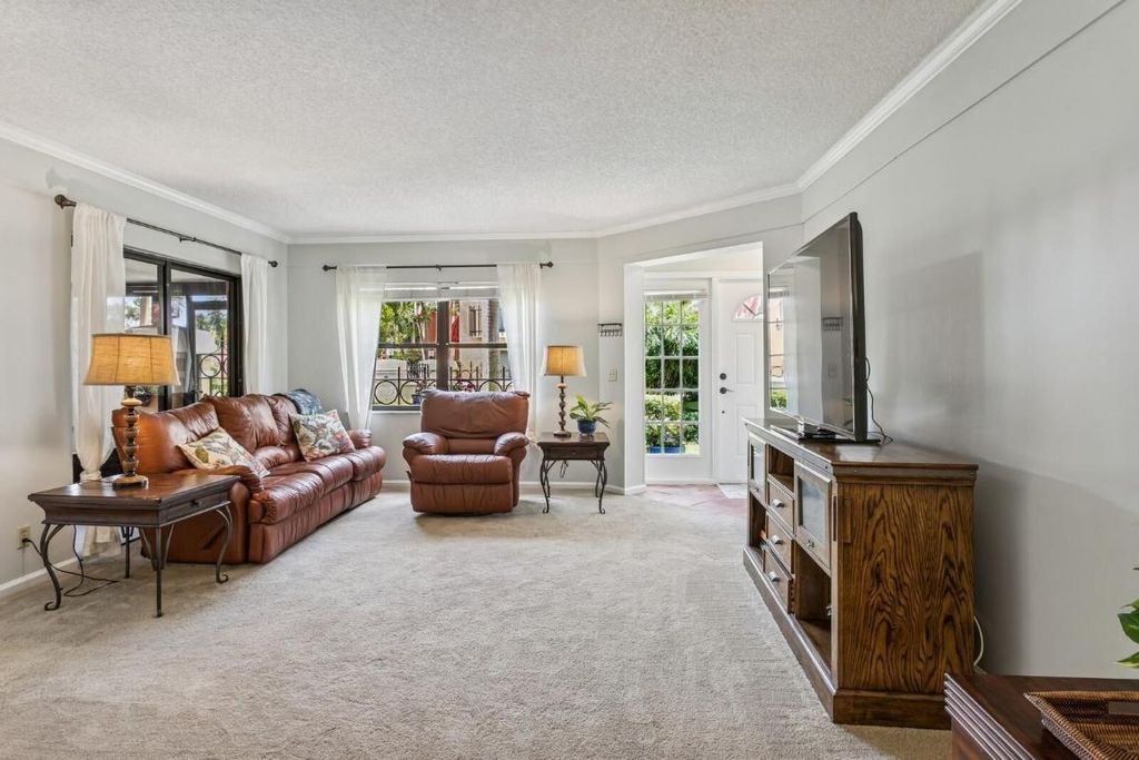 Photo of 24 Uno Lago Drive, Juno Beach, FL 33408 (MLS # R11094848)