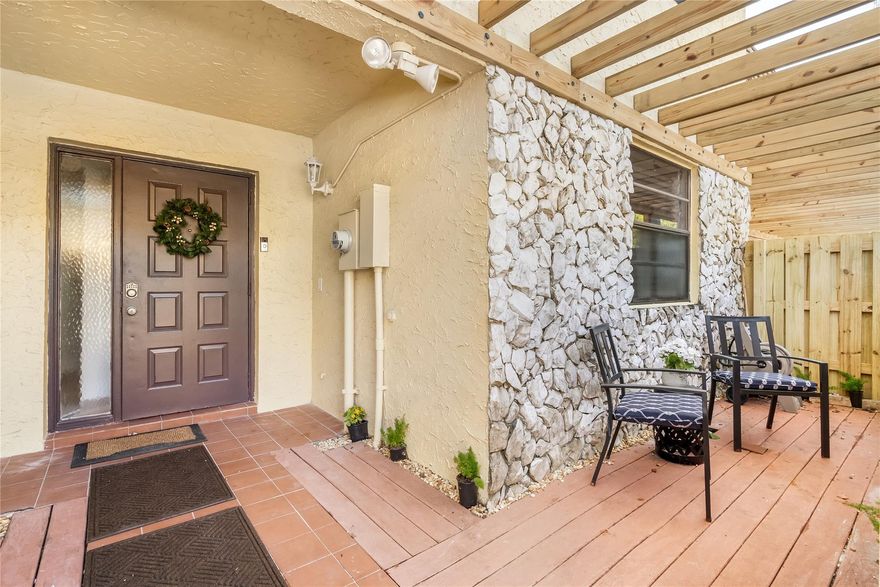 Come see this newly remodeled open concept townhouse featuring a brand new kitchen and downstairs flooring. At almost 1900 square feet under air and tons of natural light, this renovated townhome in the heart of Plantation is perfect for the family or friends needing some space with their own personal bathrooms. All three bathrooms have also been recently remodeled. Large living room/dining room with kitchen featuring bar seating and SS appliances. Fenced back patio great for outdoor dining and entertaining. Unit comes with W/D and two assigned parking spaces directly in front with ample guest parking. Community has a pool, tennis court, and play area for the kids. Close to central park and the new Plantation Walk.