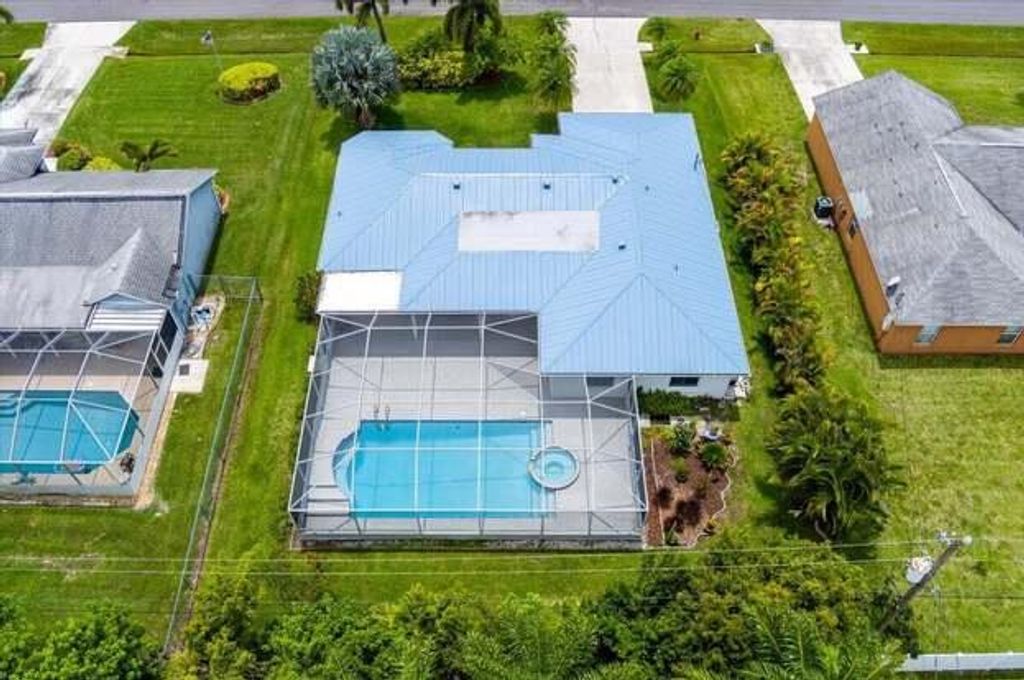 Photo of 6461 NW Friendly Circle, Port Saint Lucie, FL 34983 (MLS # R11063097)