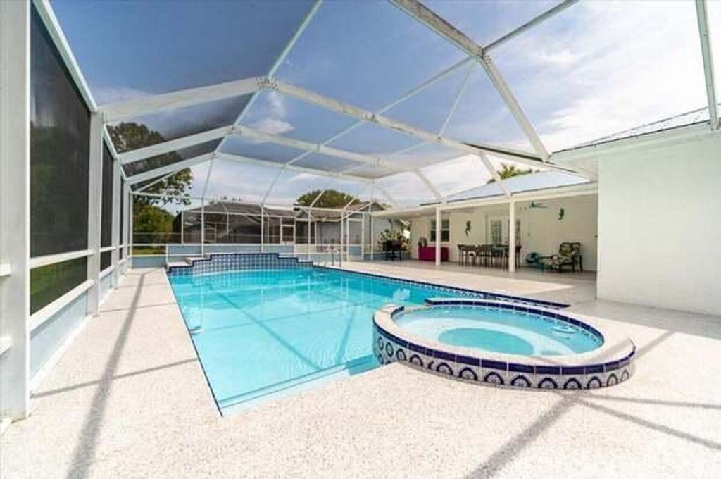 Photo of 6461 NW Friendly Circle, Port Saint Lucie, FL 34983 (MLS # R11063097)