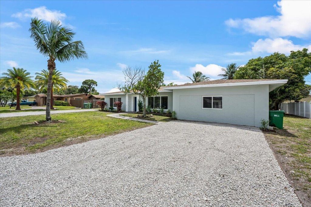 Photo of 1612 Sherwood Avenue, Mangonia Park, FL 33407 (MLS # B26017007)