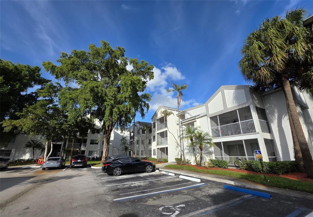 Photo of 5672 Rock Island Road #255, Tamarac, FL 33319 (MLS # B26028157)