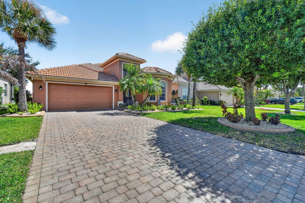 Photo of 332 NW Stratford Lane, Port Saint Lucie, FL 34983 (MLS # B26023816)