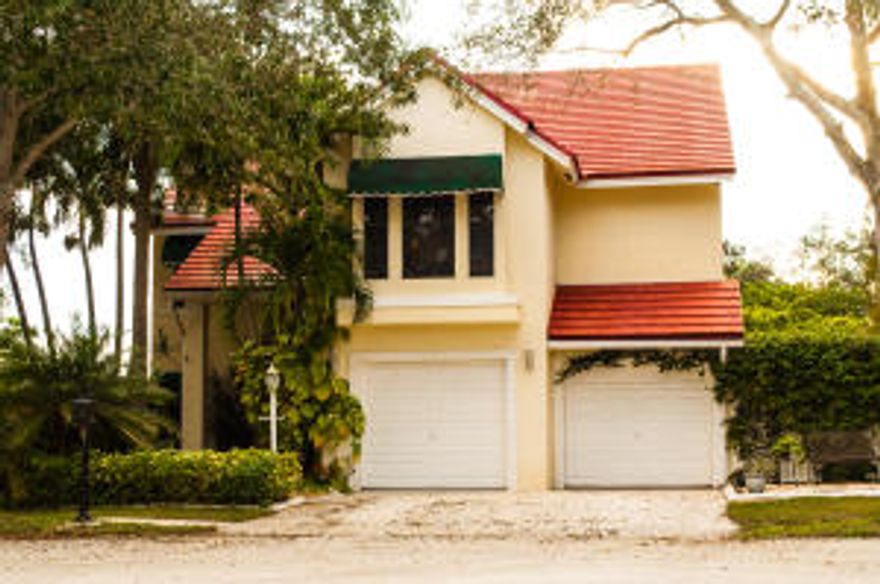 This beautiful Contemporary and pleasantly spacious 2-story home features 4 bedrooms, 2 1/2 bathrooms, 1 studio/den, with a pool and Jacuzzi on one of the largest lots in this highly sought after neighborhood. Upon entering the foyer you will find french doors leading to the studio/den, which can be used as an office or bedroom. The first floor invites you to enjoy a large living room and family room,featuring a eye catching decorative stone wall accent, and high ceiling. The newly remodeled open kitchen has ample cabinetry and granite counter tops, stainless steel appliances, and beautiful windows allowing lot of natural light. In pleasant view from the kitchen, you will find a spectacular outdoor area, featuring tropical landscaping and a beautifully designed pool and patio area, which