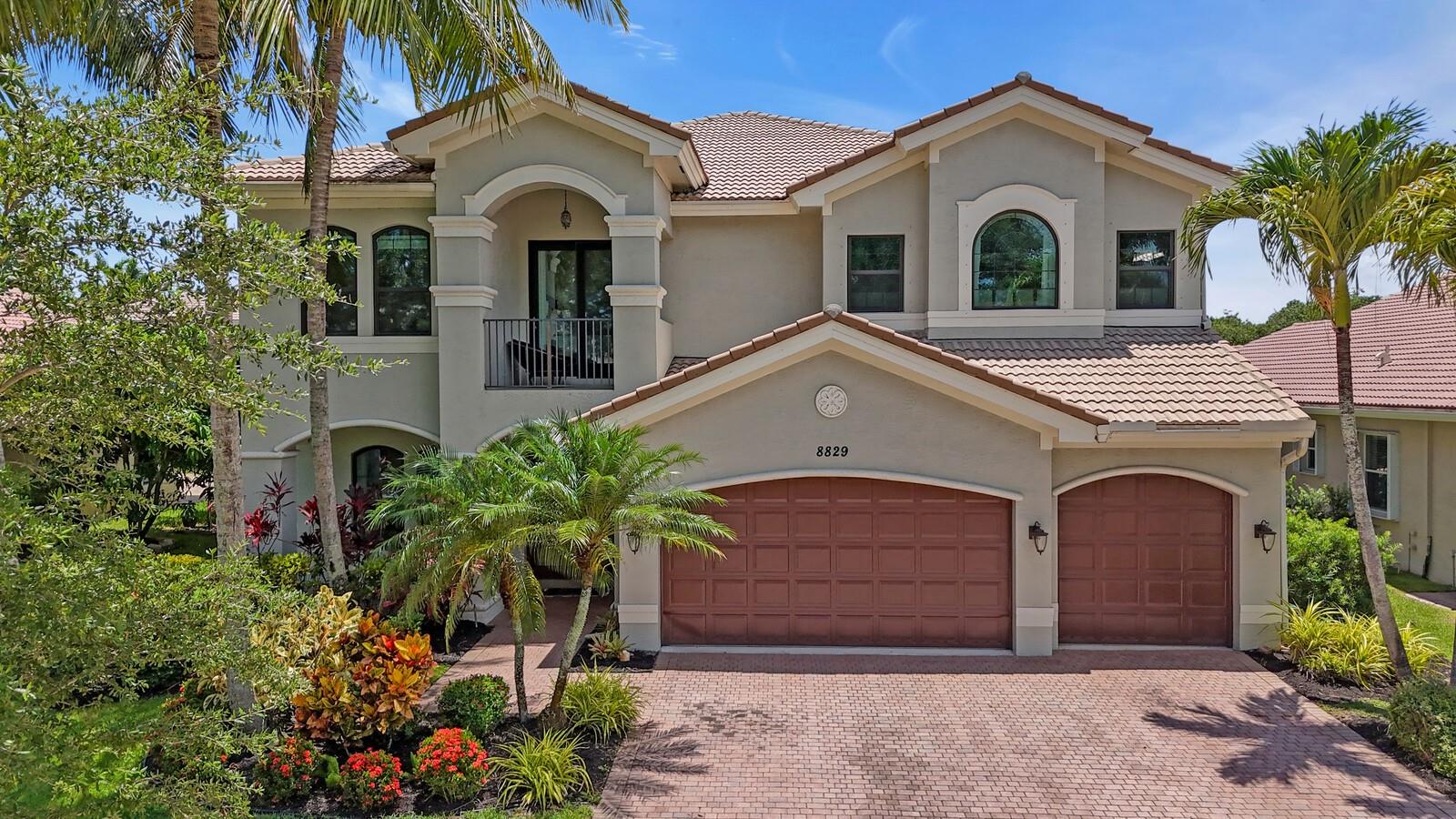 Welcome to your dream floor plan in the gated community of Canyon Isles! This spacious 5-bedroom home offers a large den ( easily converted into 6th bedroom) 4 full bathrooms, ALL impact windows and doors, and a fully renovated kitchen. Enjoy marble floors downstairs and hardwood floors upstairs, with 1 large bedroom and full bathroom located on the main level. Equipped with Tesla solar panels and 4 backup batteries for significant energy savings! The oversized primary suite offers a generous seating area ideal for an office, gym, or lounge while overlooking your backyard paradise. Step outside into your tropical backyard oasis with a saltwater pool, fully fenced yard, large covered patio, & fruit trees, perfect for relaxing or entertaining. All A rated schools w/ resort style amenities