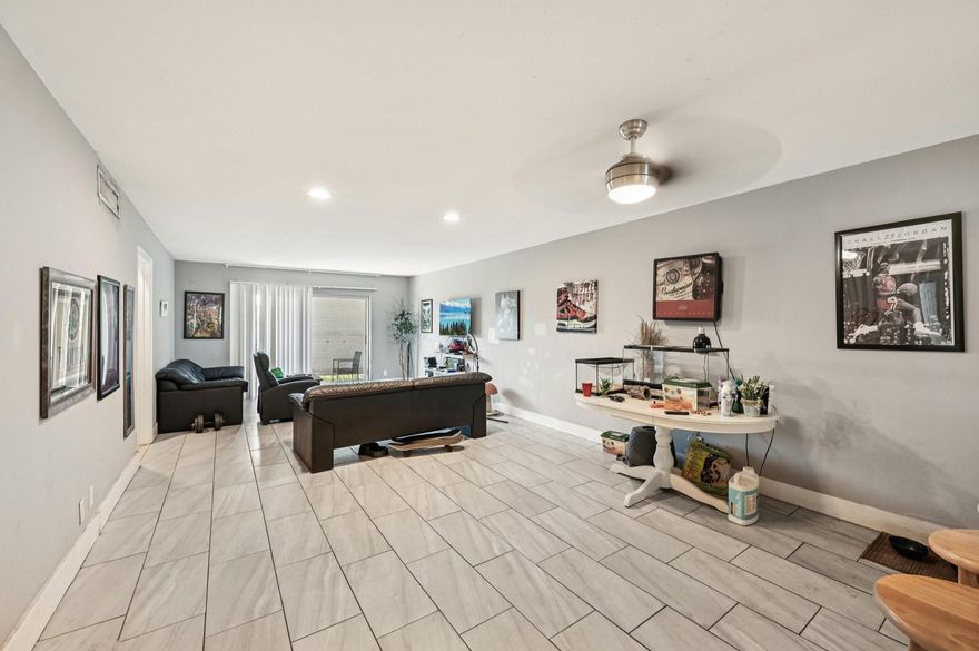 Bright and nicely updated 2 bedroom 2 bathroom ground level unit, split floor plan, parking space up front, stainless steel appliances, Modern kitchen with granite countertops, tile flooring throughout, large primary bedroom with a walk-in closet. Guest bedroom is spacious with ample closet space, Bathrooms include, shower & bathtub with granite counter tops, This all-ages community offers a pool, gated security, and includes basic cable and water. #111 is Move-in ready and easy to love!