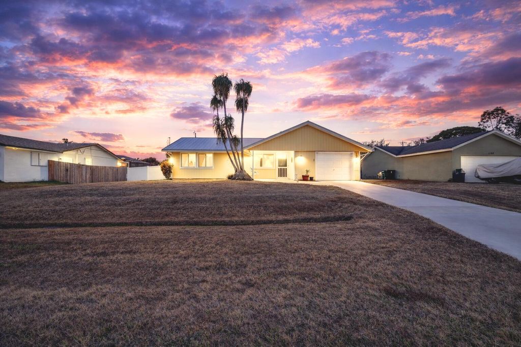 Photo of 1202 SW Granadeer Street, Port Saint Lucie, FL 34983 (MLS # R11164605)