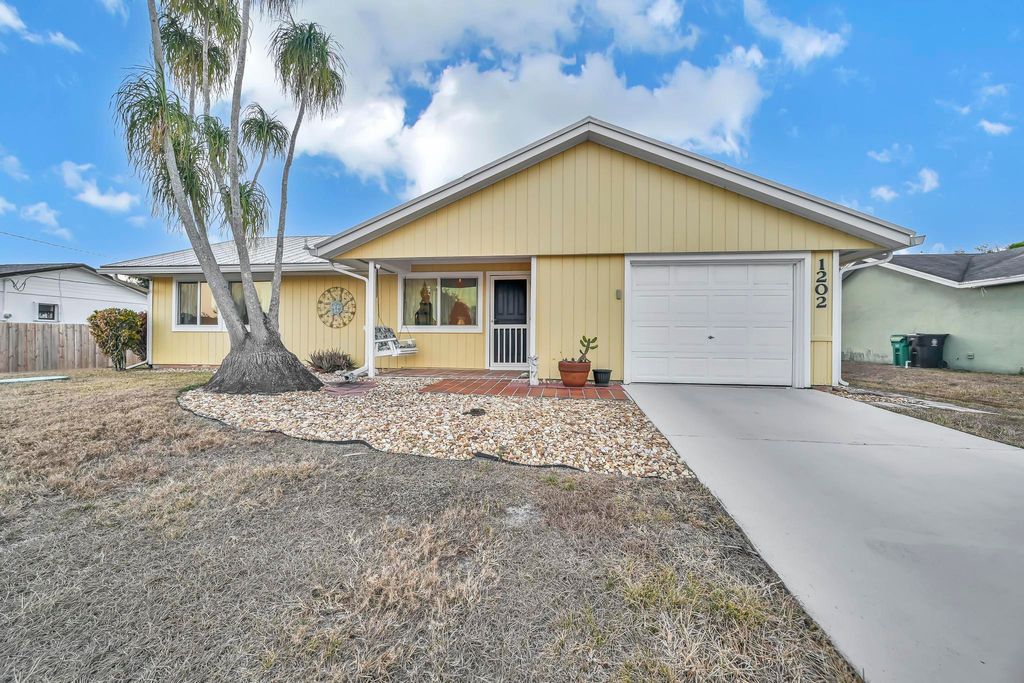 Photo of 1202 SW Granadeer Street, Port Saint Lucie, FL 34983 (MLS # R11164605)