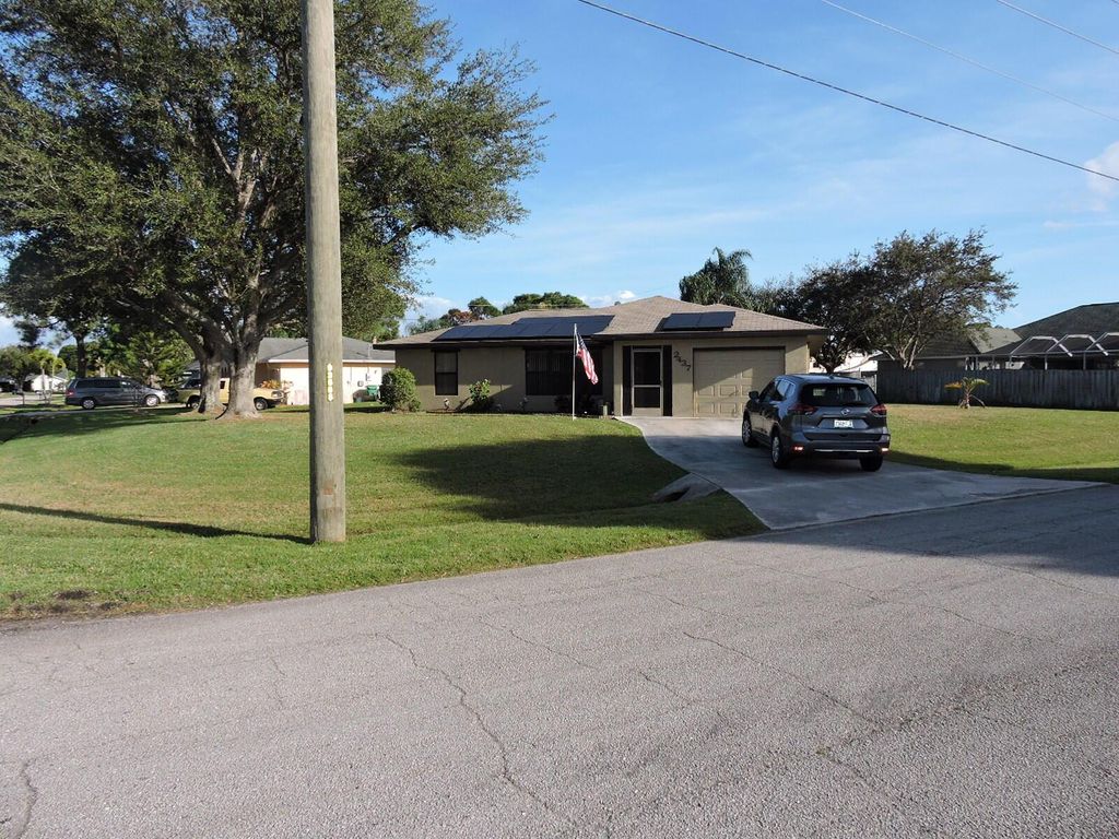 Photo of 2437 SE Calais Street, Port St Lucie, FL 34952 (MLS # R10933889)