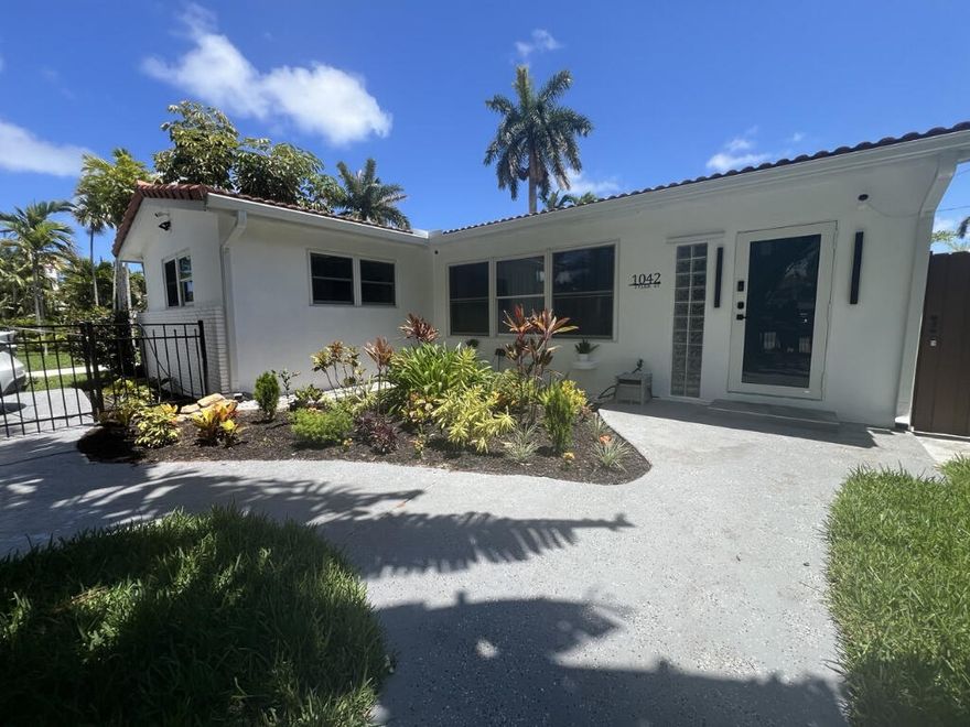 Welcome to this beautifully maintained 3-bedroom, 2-bath single-family home located in the highly desirable Hollywood Lakes neighborhood. This residence modern comfort, featuring an open-concept layout, abundant natural light, and a welcoming atmosphere throughout.The kitchen is perfect for cooking and entertaining, boasting stone countertops, modern appliances including a gas range, a breakfast bar, and newer cabinetry. Spacious bedrooms provide plenty of comfort, while the primary suite offers a luxurious renovated bathroom complete with an oversized walk-in shower.Step outside to your own private retreat — a fenced backyard with a heated pool, perfect for relaxing or hosting gatherings year-round.Ideally situated near parks, lakes, the beach, and vibrant downtown Hollywood,