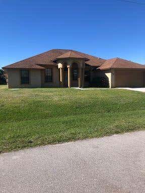 Photo of 4186 SW Jarmer Road, Port Saint Lucie, FL 34953 (MLS # R10763362)