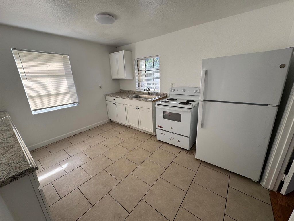 Photo of 717 43 Street, West Palm Beach, FL 33407 (MLS # R11147489)