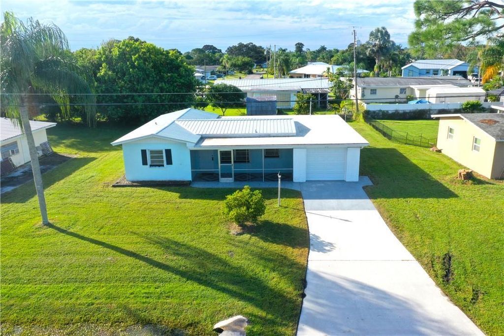 Photo of 610 Beach Avenue, Port St Lucie, FL 34952 (MLS # R10929458)