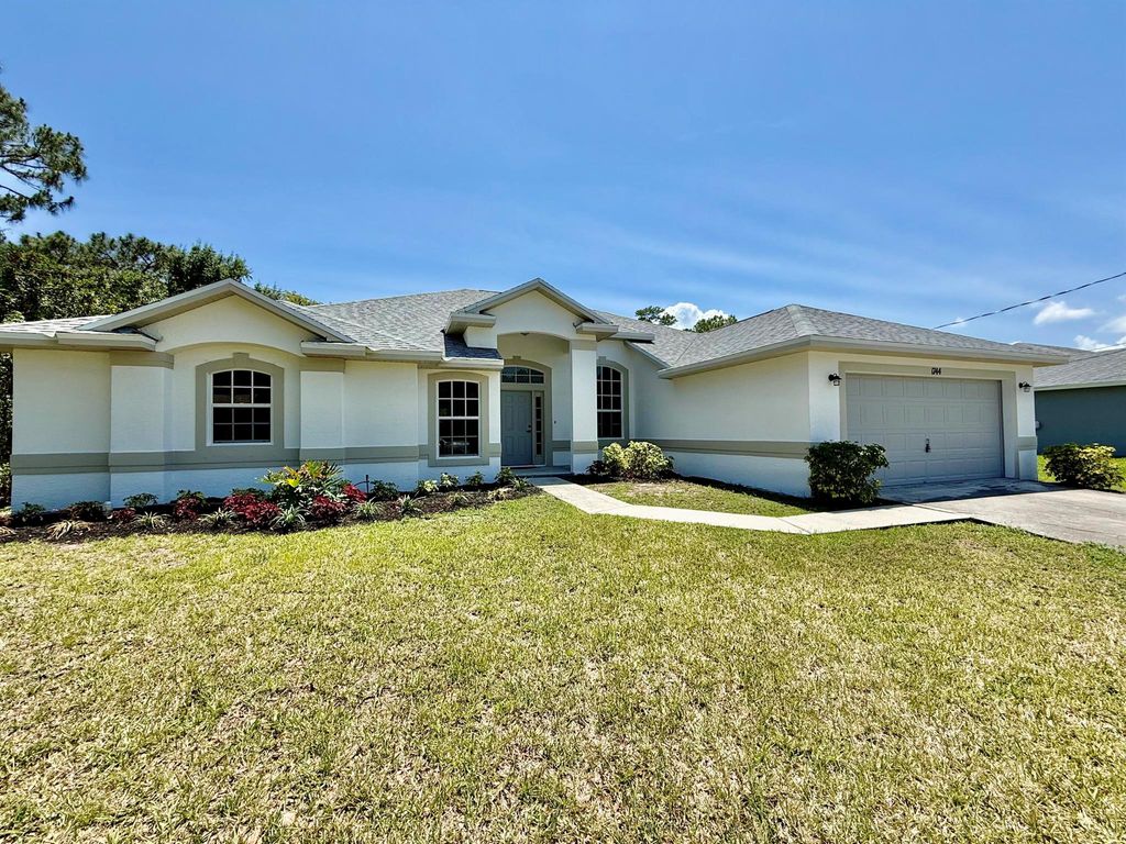 Photo of 1744 SW Nantucket Avenue, Port Saint Lucie, FL 34953 (MLS # R11088581)