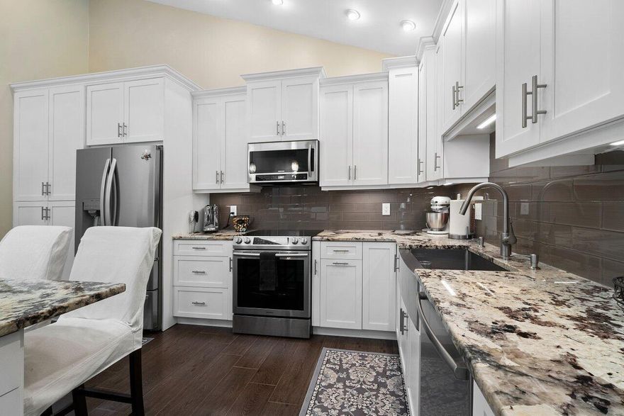 This is a beautiful townhouse with 3 bedrooms, and 3 1/2 baths.  Master Bedroom is on main floor.  Kitchen is a chef's delight!  Private screened pool and patio for easy entertaining.  Sliders have impact glass, along with accordion shutters on unit. Within the past year, the following major appliances have been replaced: A/C, hot water heater, pool pump, refrigerator, washer and dryer too. Great community in Palm Beach Gardens.  Call today for more info or to schedule your private showing.